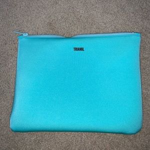 light blue triangl swim suit bag